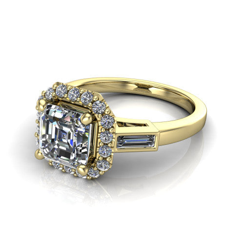 Lorelai asscher halo engagement ring in 14K Yellow Gold, three-quarter perspective showing the haloed center between two tapered baguette side stones on a slim polished band