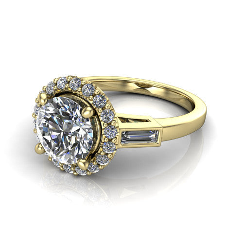 Lorelai round halo engagement ring in 14K Yellow Gold, three-quarter perspective showing the haloed center between two tapered baguette side stones on a slim polished band