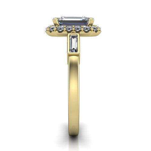 Lorelai emerald halo engagement ring in 14K Yellow Gold, side profile showing the tapered baguette side stone and the smooth polished band
