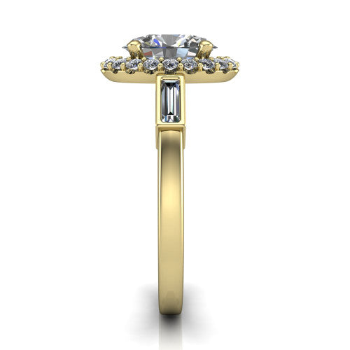 Lorelai oval halo engagement ring in 18K Yellow Gold, side profile showing the tapered baguette side stone and the smooth polished band
