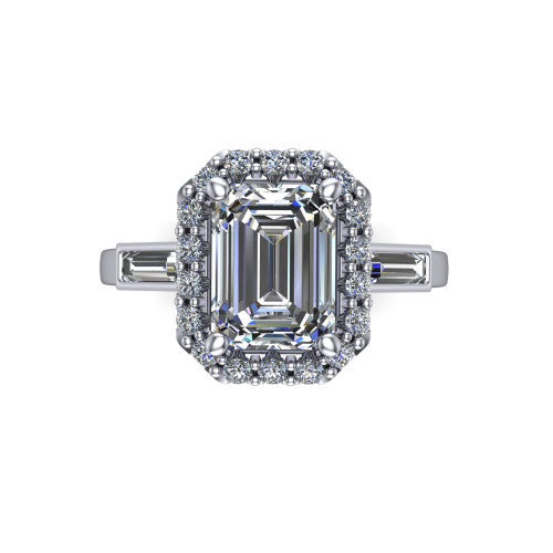 Lorelai emerald halo engagement ring in 14K White Gold, top-down view showing the center diamond framed by a pav&eacute; halo and flanked by two tapered baguette side stones