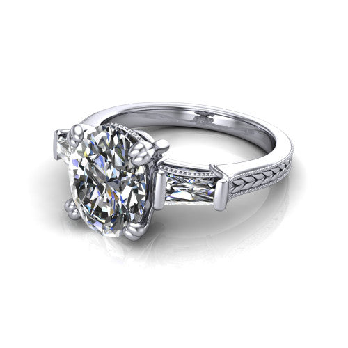 Camille oval three stone engagement ring in Platinum, three-quarter perspective showing the center diamond between two tapered baguette side stones above a hand-engraved band