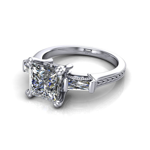 Camille princess three stone engagement ring in Platinum, three-quarter perspective showing the center diamond between two tapered baguette side stones above a hand-engraved band