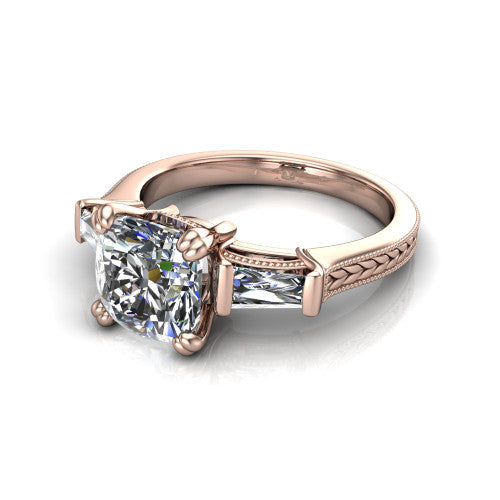 Camille cushion three stone engagement ring in 18K Rose Gold, three-quarter perspective showing the center diamond between two tapered baguette side stones above a hand-engraved band