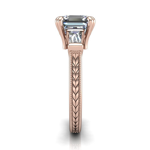 Camille asscher three stone engagement ring in 14K Rose Gold, side profile showing the tapered baguette side stone and the hand-engraved wheat pattern down the band