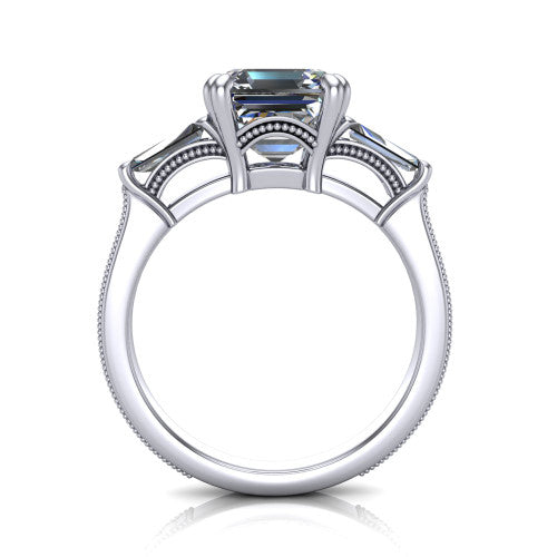 Camille asscher three stone engagement ring in 18K White Gold, through-finger front profile showing the three-stone head raised above the engraved milgrain shank