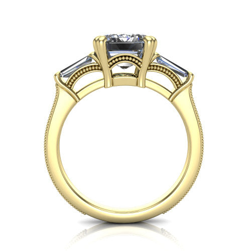 Camille emerald three stone engagement ring in 14K Yellow Gold, through-finger front profile showing the three-stone head raised above the engraved milgrain shank