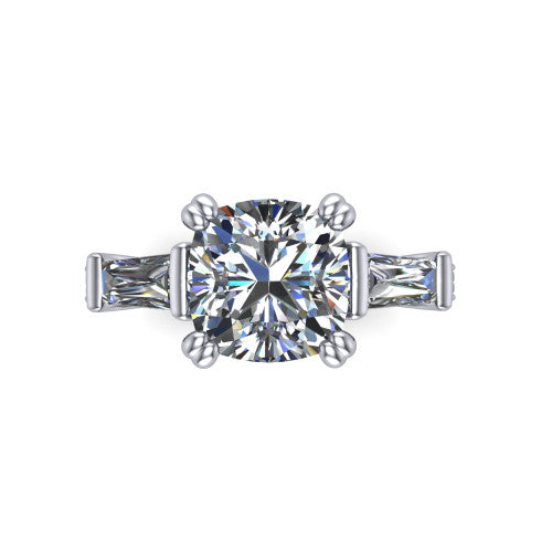 Camille cushion three stone engagement ring in Platinum, top-down view showing the center diamond flanked by two tapered baguette side stones in a three stone setting