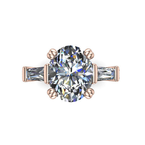 Camille oval three stone engagement ring in 14K Rose Gold, top-down view showing the center diamond flanked by two tapered baguette side stones in a three stone setting