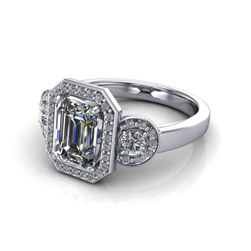 Wrenley emerald halo engagement ring in Platinum, three-quarter perspective showing the haloed center raised above a slim polished band