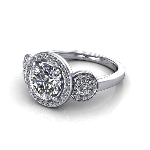 Wrenley round halo engagement ring in Platinum, three-quarter perspective showing the haloed center raised above a slim polished band