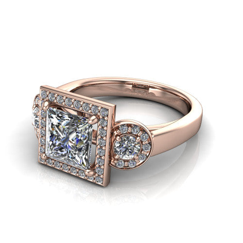 Wrenley princess halo engagement ring in 14K Rose Gold, three-quarter perspective showing the haloed center raised above a slim polished band
