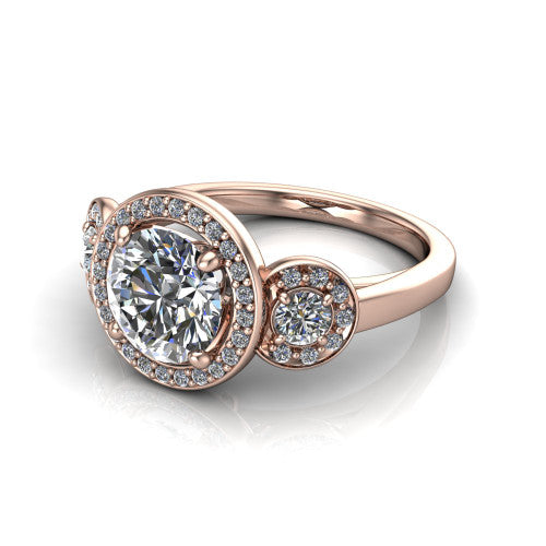 Wrenley round halo engagement ring in 18K Rose Gold, three-quarter perspective showing the haloed center raised above a slim polished band