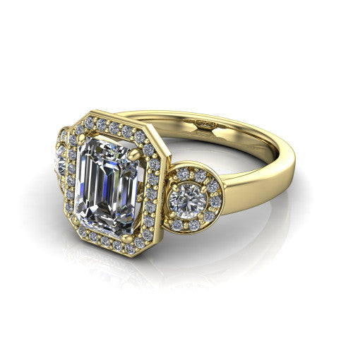 Wrenley emerald halo engagement ring in 18K Yellow Gold, three-quarter perspective showing the haloed center raised above a slim polished band