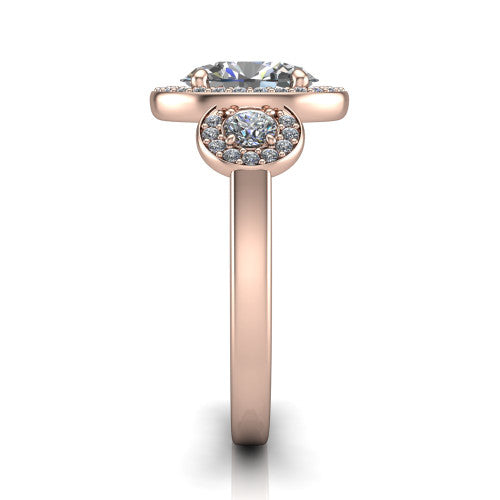 Wrenley oval halo engagement ring in 18K Rose Gold, side profile showing the halo and the smooth tapered polished band