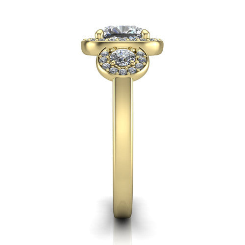 Wrenley cushion three stone engagement ring in 14K Yellow Gold, side profile showing a haloed round side stone and the smooth polished band