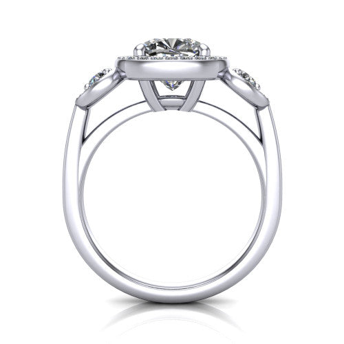 Wrenley cushion three stone engagement ring in 18K White Gold, through-finger front profile showing the three-stone halo head above the polished shank and trellis gallery