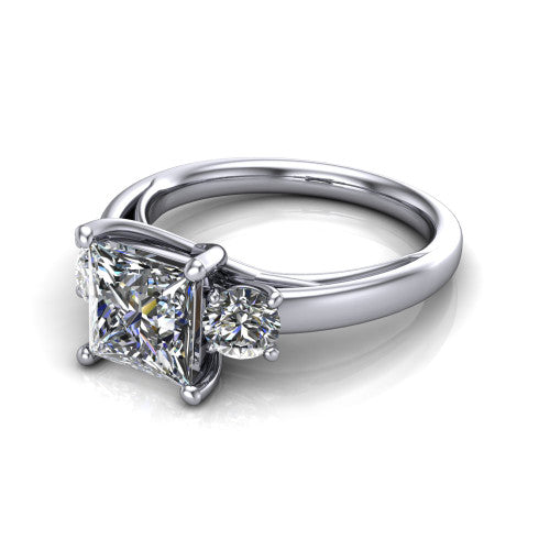 Alyssa princess classic engagement ring in 18K White Gold, three-quarter perspective showing the center diamond between two round side stones on a slim polished band