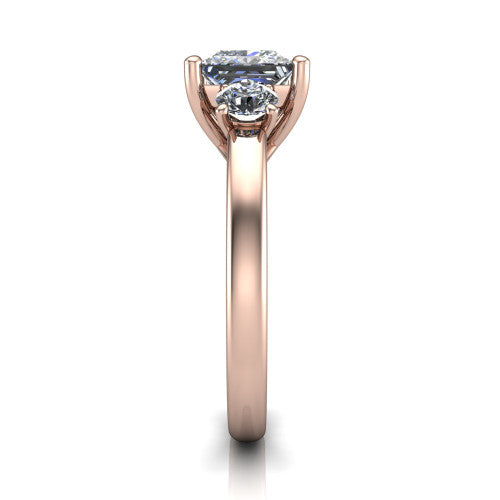 Alyssa princess classic engagement ring in 18K Rose Gold, side profile showing the round side stone and the smooth tapered polished band