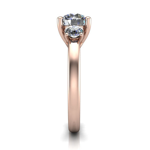 Alyssa round classic engagement ring in 14K Rose Gold, side profile showing the round side stone and the smooth tapered polished band