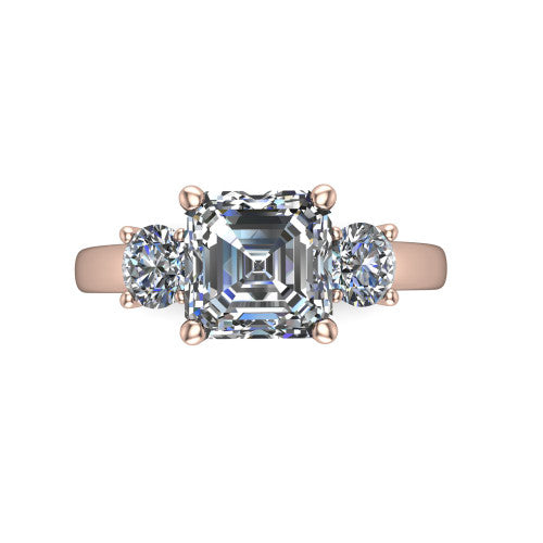 Alyssa asscher classic engagement ring in 14K Rose Gold, top-down view showing the center diamond flanked by two round side stones in a classic three stone setting