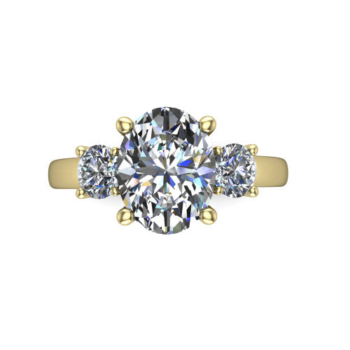 Alyssa oval classic engagement ring in 14K Yellow Gold, top-down view showing the center diamond flanked by two round side stones in a classic three stone setting