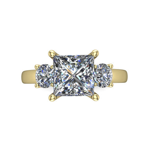 Alyssa princess classic engagement ring in 14K Yellow Gold, top-down view showing the center diamond flanked by two round side stones in a classic three stone setting