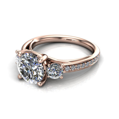 London round classic engagement ring in 14K Rose Gold, three-quarter perspective showing the center diamond between two round side stones above a pav&eacute; shank