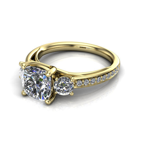 London cushion classic engagement ring in 18K Yellow Gold, three-quarter perspective showing the center diamond between two round side stones above a pav&eacute; shank
