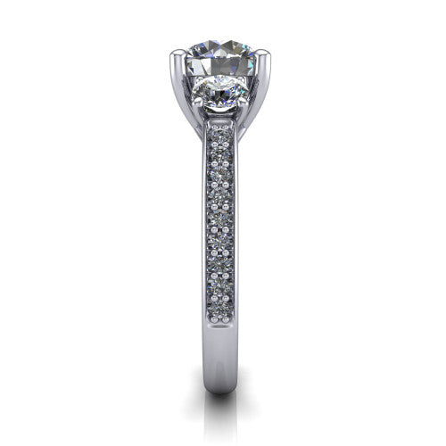 London round classic engagement ring in Platinum, side profile showing the round side stone and the pav&eacute; diamonds running down the shank