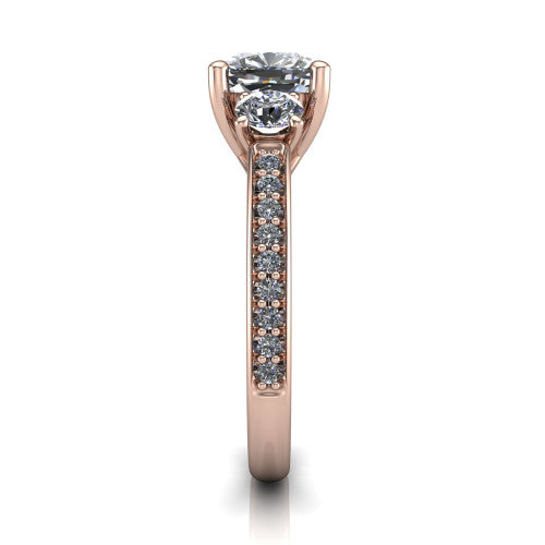 London cushion classic engagement ring in 18K Rose Gold, side profile showing the round side stone and the pav&eacute; diamonds running down the shank