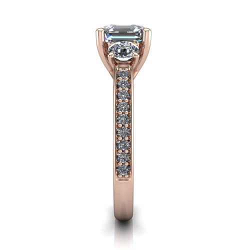 London asscher classic engagement ring in 14K Rose Gold, side profile showing the round side stone and the pav&eacute; diamonds running down the shank