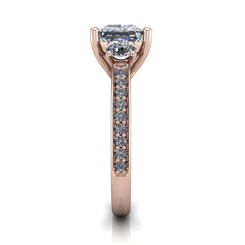 London princess classic engagement ring in 14K Rose Gold, side profile showing the round side stone and the pav&eacute; diamonds running down the shank