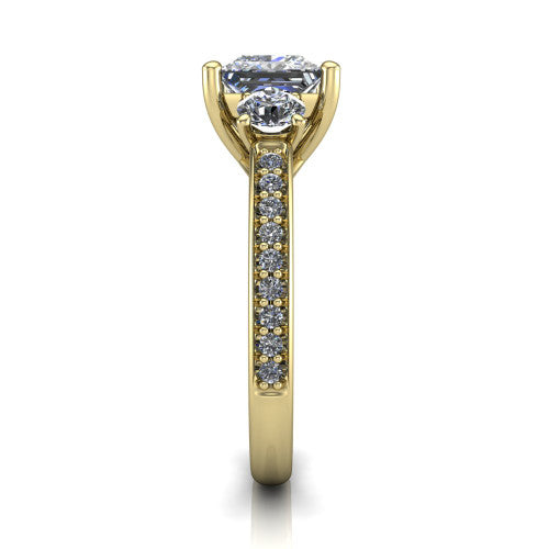 London princess classic engagement ring in 18K Yellow Gold, side profile showing the round side stone and the pav&eacute; diamonds running down the shank