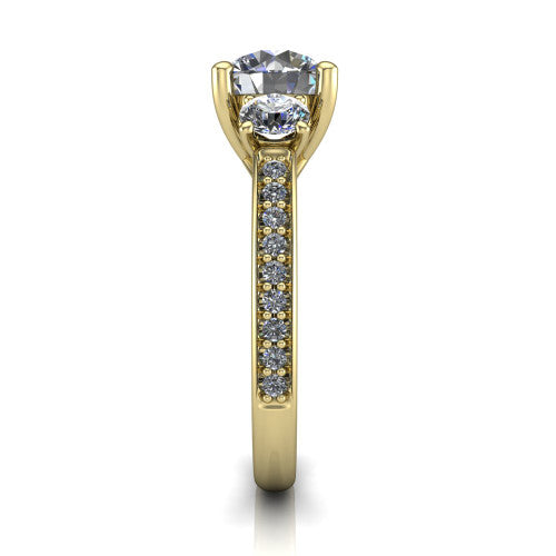 London round classic engagement ring in 14K Yellow Gold, side profile showing the round side stone and the pav&eacute; diamonds running down the shank