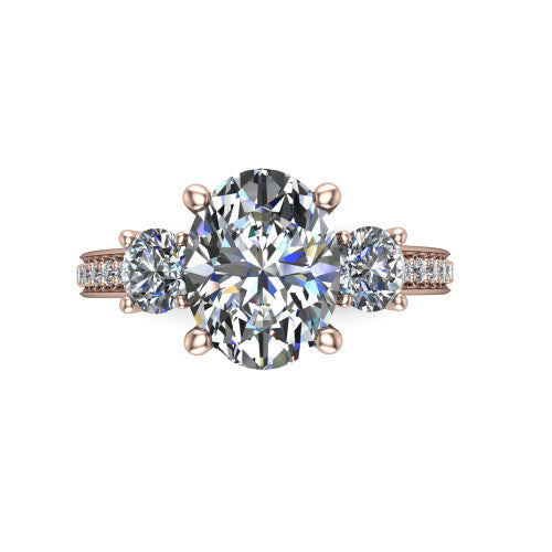 London oval classic engagement ring in 18K Rose Gold, top-down view showing the center diamond flanked by two round side stones in a classic three stone setting