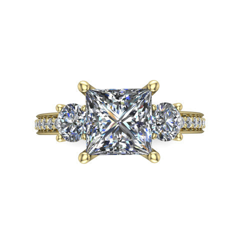 London princess classic engagement ring in 18K Yellow Gold, top-down view showing the center diamond flanked by two round side stones in a classic three stone setting