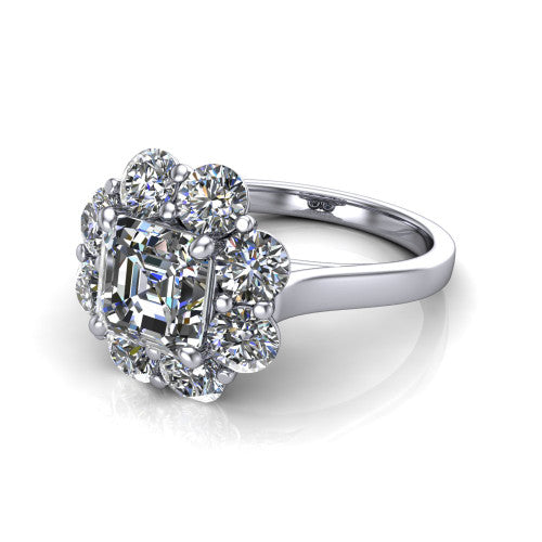 Gabriela asscher halo engagement ring in Platinum, three-quarter perspective showing the center framed by a cluster halo of round diamonds above a slim polished band