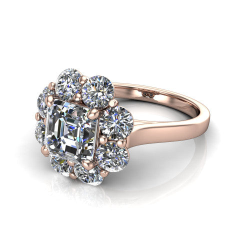 Gabriela asscher halo engagement ring in 18K Rose Gold, three-quarter perspective showing the center framed by a cluster halo of round diamonds above a slim polished band