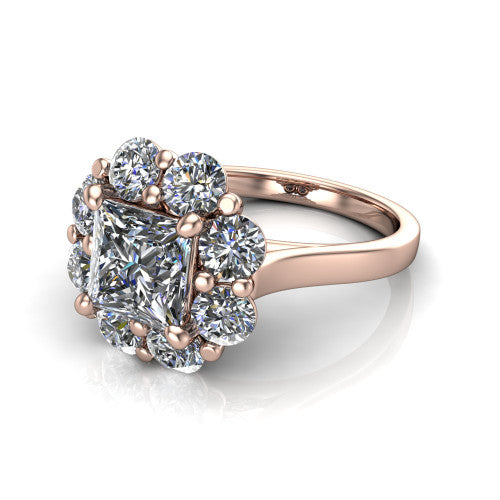 Gabriela princess halo engagement ring in 18K Rose Gold, three-quarter perspective showing the center framed by a cluster halo of round diamonds above a slim polished band