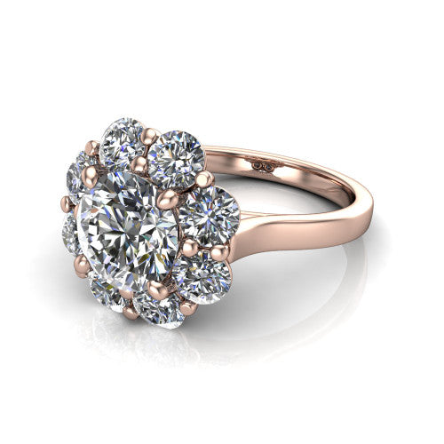 Gabriela round halo engagement ring in 14K Rose Gold, three-quarter perspective showing the center framed by a cluster halo of round diamonds above a slim polished band