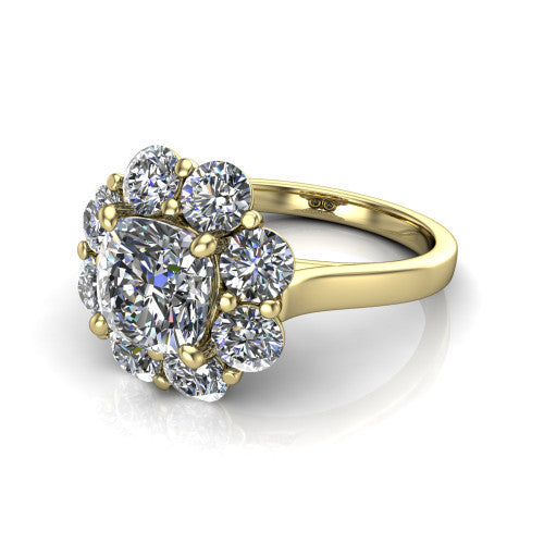 Gabriela cushion halo engagement ring in 14K Yellow Gold, three-quarter perspective showing the center framed by a cluster halo of round diamonds above a slim polished band