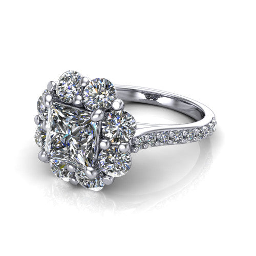 Brooklynn princess halo engagement ring in 18K White Gold, three-quarter perspective showing the center framed by a cluster halo of round diamonds above a pav&eacute; shank