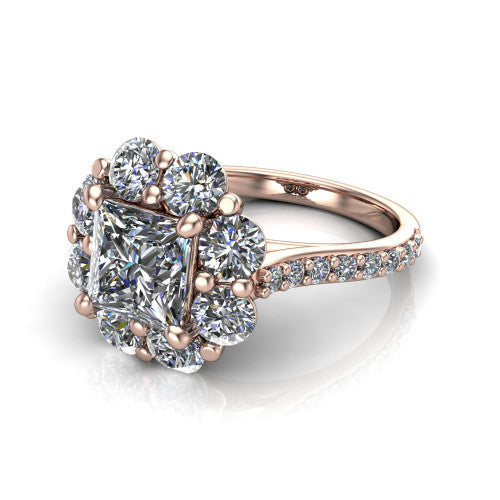 Brooklynn princess halo engagement ring in 14K Rose Gold, three-quarter perspective showing the center framed by a cluster halo of round diamonds above a pav&eacute; shank