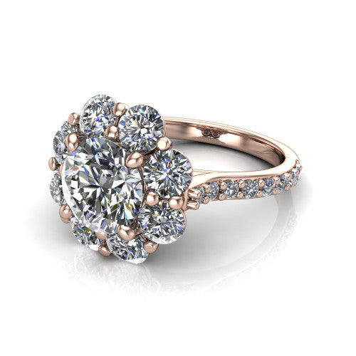 Brooklynn round halo engagement ring in 14K Rose Gold, three-quarter perspective showing the center framed by a cluster halo of round diamonds above a pav&eacute; shank