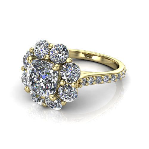 Brooklynn cushion halo engagement ring in 14K Yellow Gold, three-quarter perspective showing the center framed by a cluster halo of round diamonds above a pav&eacute; shank