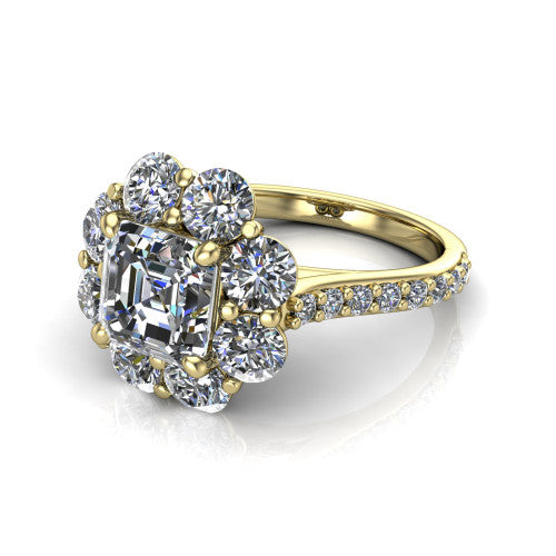Brooklynn asscher halo engagement ring in 14K Yellow Gold, three-quarter perspective showing the center framed by a cluster halo of round diamonds above a pav&eacute; shank