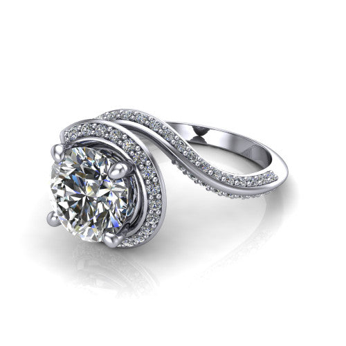 Paislee round halo engagement ring in 18K White Gold, three-quarter perspective showing the center wrapped in a swirling pav&eacute; bypass halo