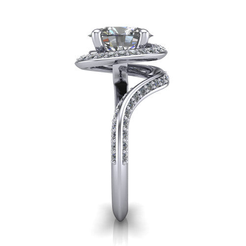 Paislee oval halo engagement ring in 14K White Gold, side profile showing the pav&eacute; halo spiraling into the twisting bypass shank