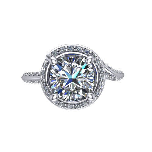 Paislee cushion halo engagement ring in Platinum, top-down view showing the center diamond encircled by a twisting pav&eacute; halo